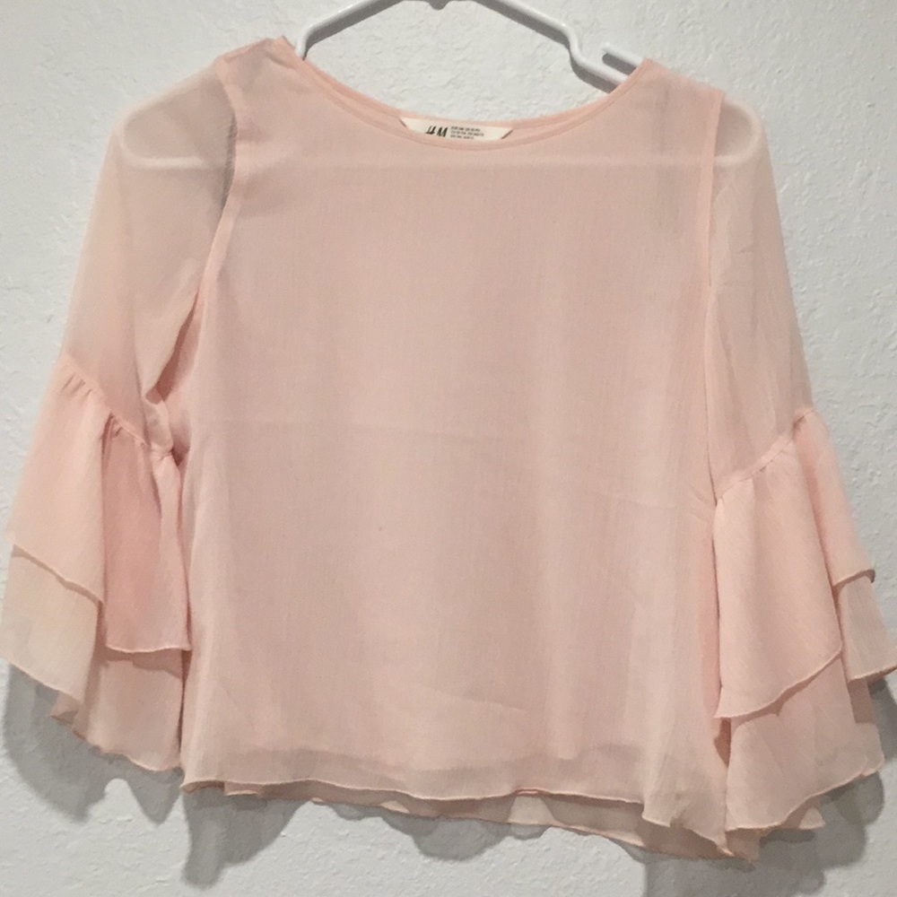 Light pink blouse.